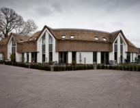 Het Gooi en Omstreken en Woningbouwvereniging Laren onderzoeken bedrijfsfusie
